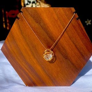 Cubic necklace with rhinestone inside